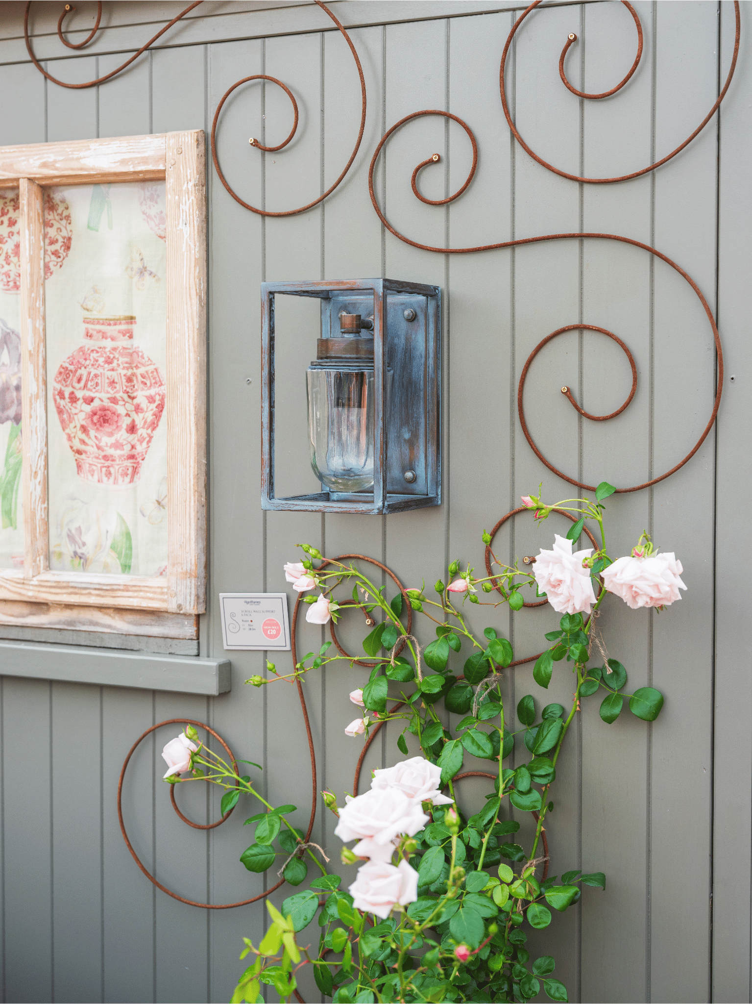 RHS Chelsea Flower Show 2025 - scroll wall trellis and Sherborne Outdoor Open Box Lantern