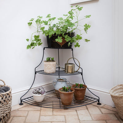 Quadrant tiered plant stand in a black finish