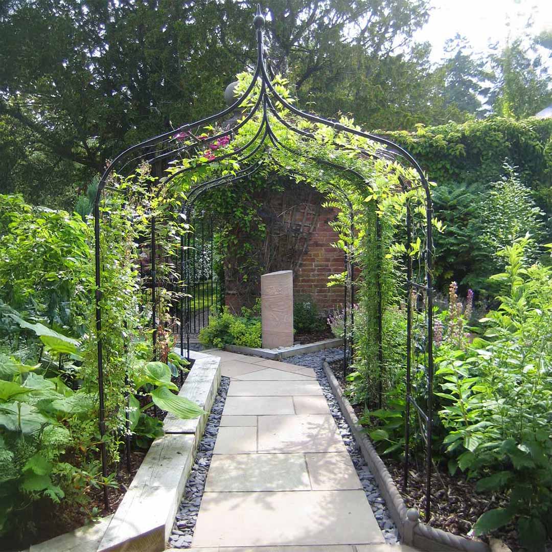 gothic-arch-pathway-green-growing-up