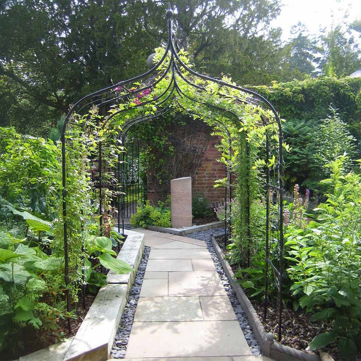 gothic-arch-pathway-green-growing-up