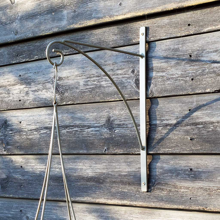 Metal bracket attached to a wooden wall