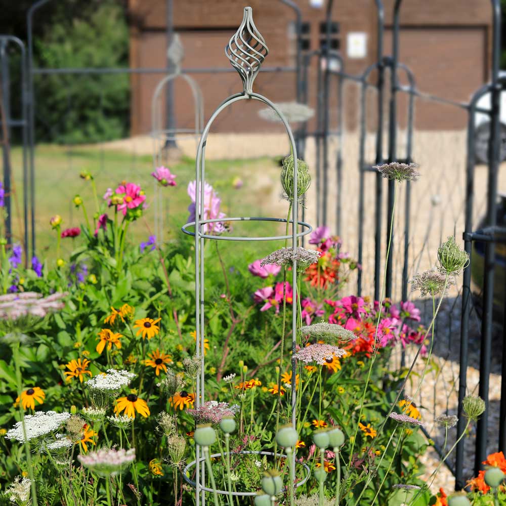 grey-elegance-obelisk-with-colourful-flowers-surrounding