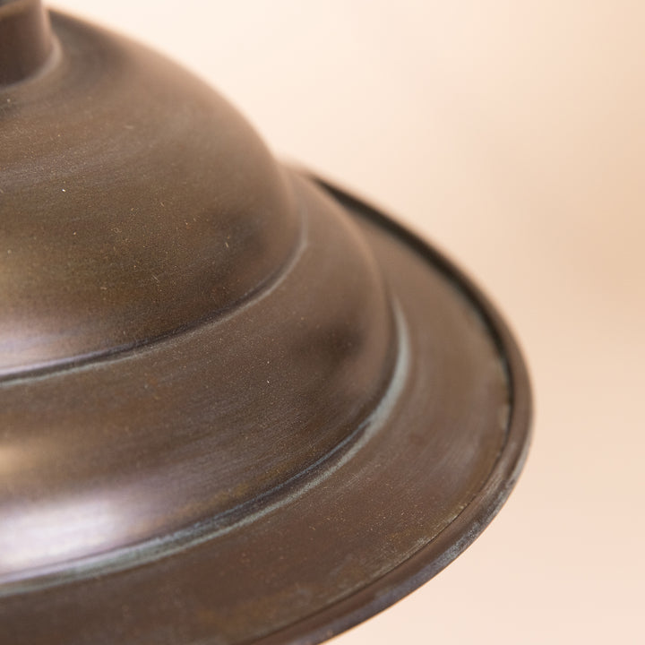 Closeup image of the shade of the Agriframes Bucklebury Outdoor Wall Lamp  in a Copper Patina finish.