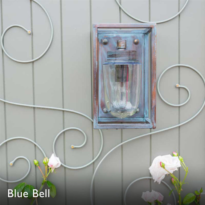 Decorative elegance wall scroll trellis with floral climbing plant, lantern on a wooden panel background.