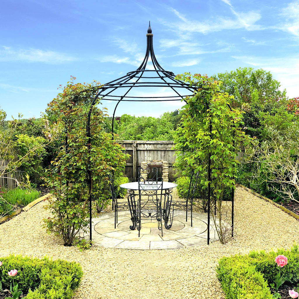 Gothic Gazebo with table and chairs underneath 
