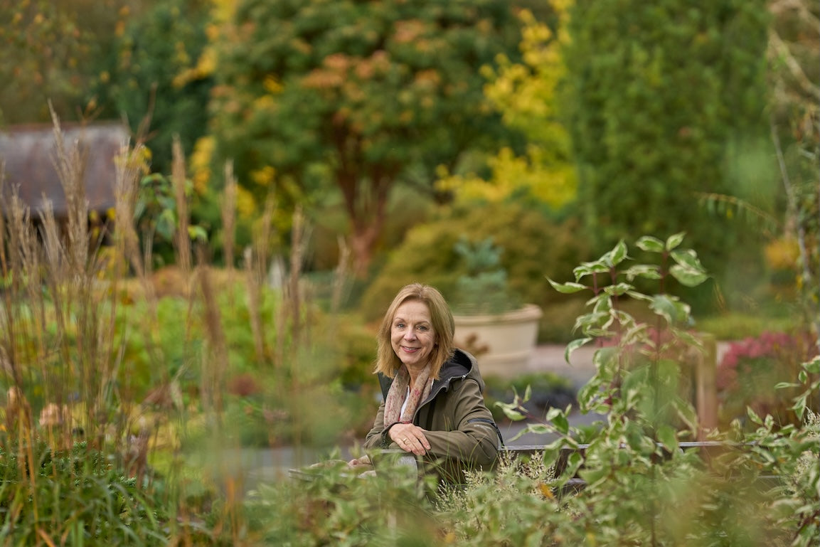 Jo Thompson sitting in the new Winter Garden at RHS Rosemoor 