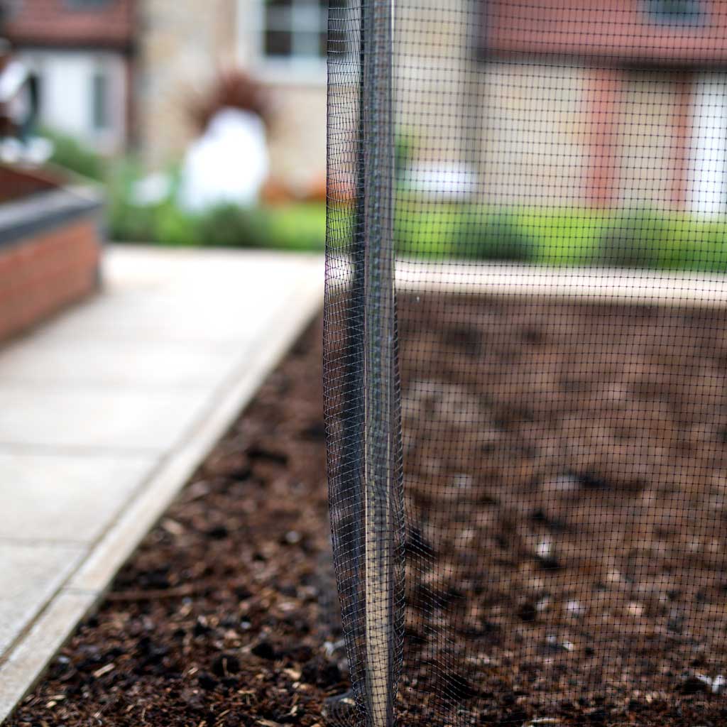 Aluminium low fruit cage tubing with netting covering it