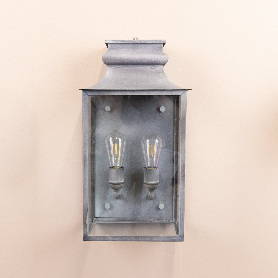 Agriframes Marlborough Coach Lantern switched off and mounted on a neutral background. 