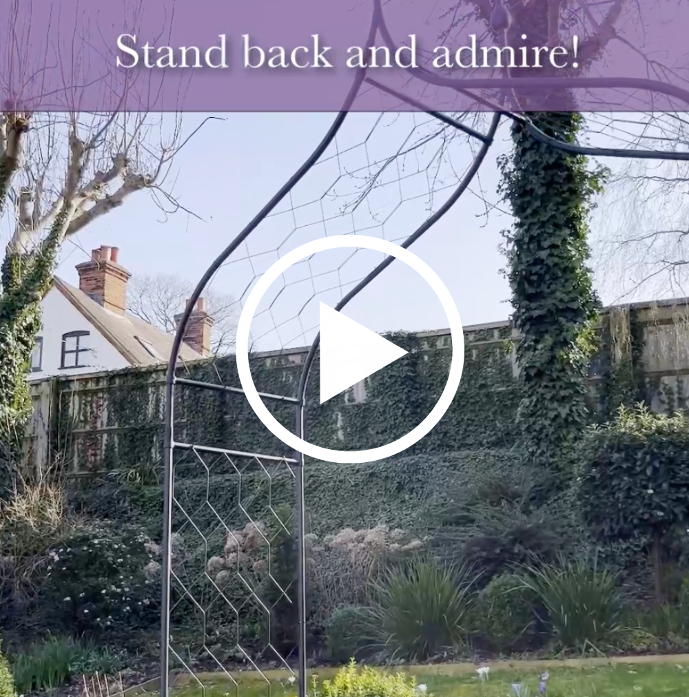 Garden scene with a play button overlay