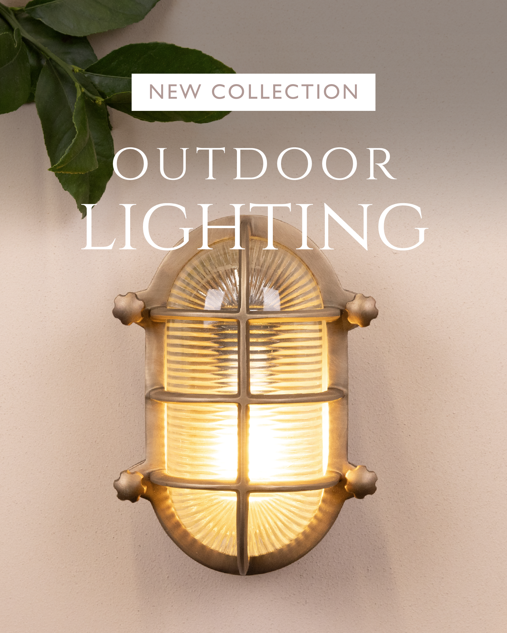 Outdoor lighting Salcombe Bulk Head Oval Lantern | Brass with warm glow on a neutral background, featuring 'New Collection Outdoor Lighting' text.