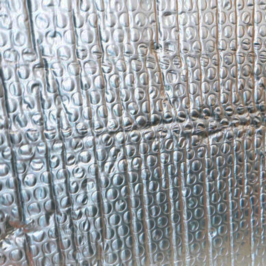 Textured metallic surface with embossed pattern