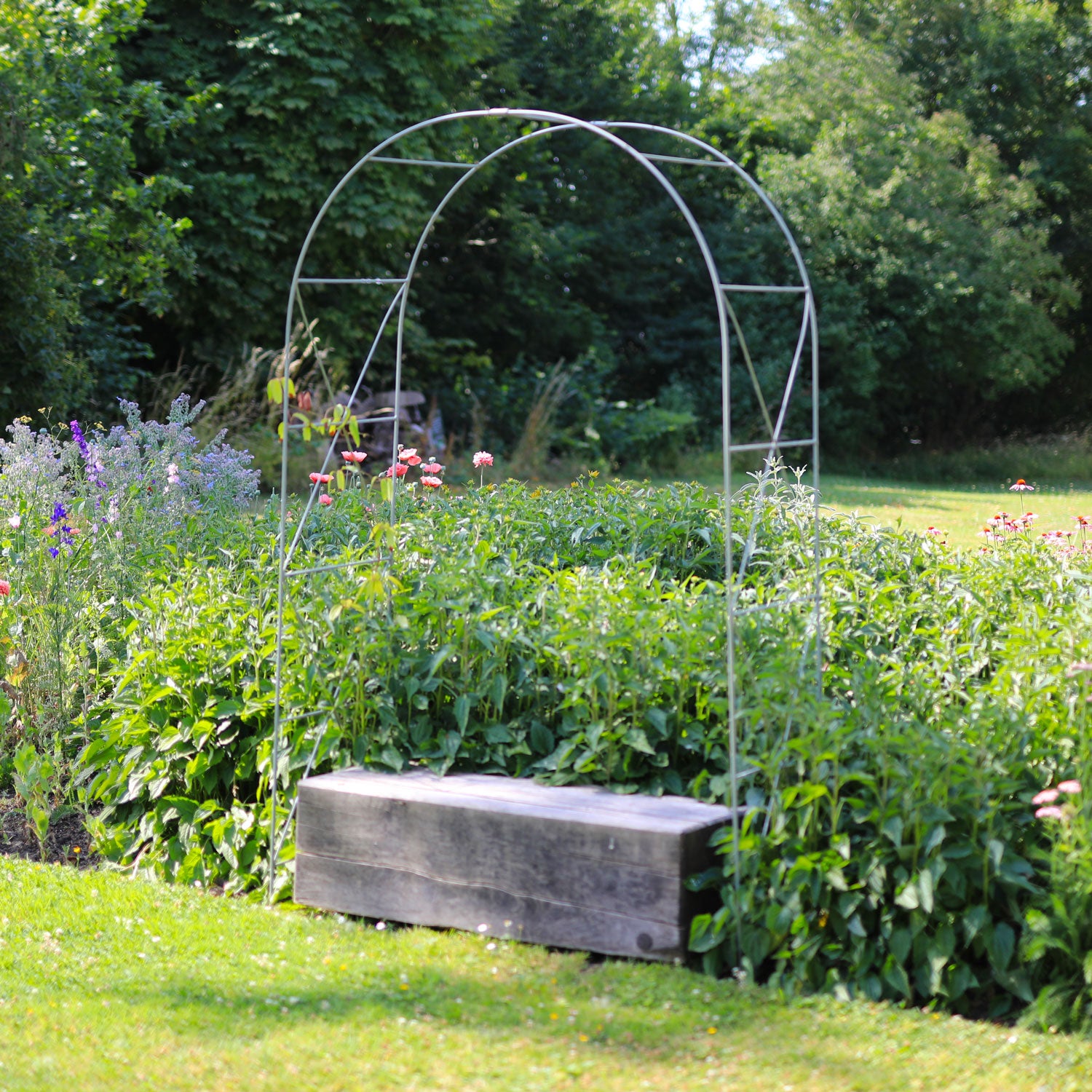 Round Arch with green beautiful flowers in the background
