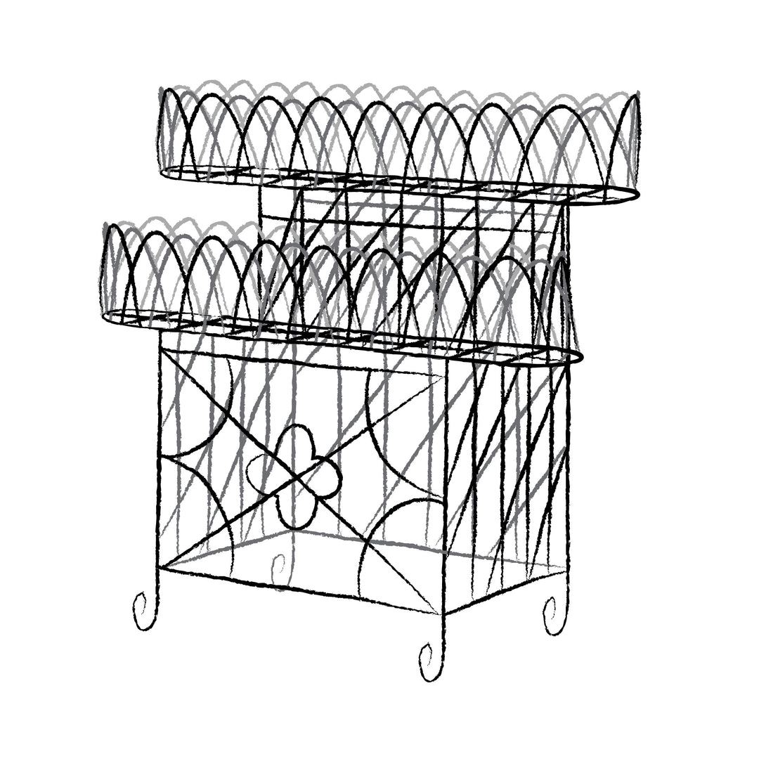 Black line drawing of a decorative metal stand with floral design on a white background