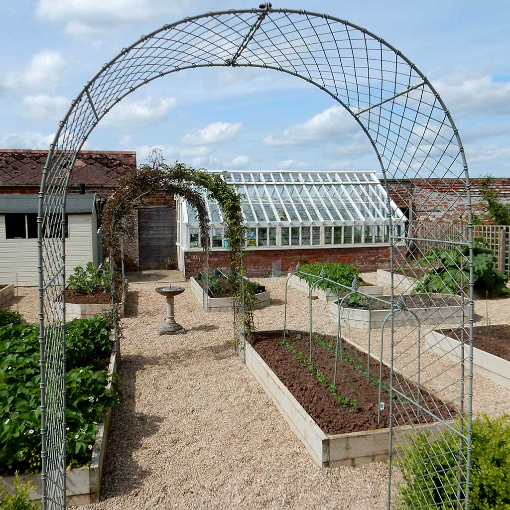 Elegance Round Arch-side view inside veg garden -agriframes