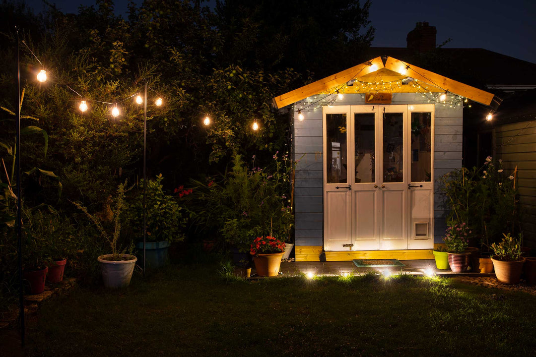 festoon lights in English garden