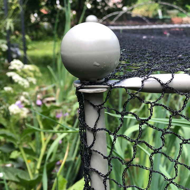Closeup of the round finial on an Agriframes Elegance Vegetable Cage