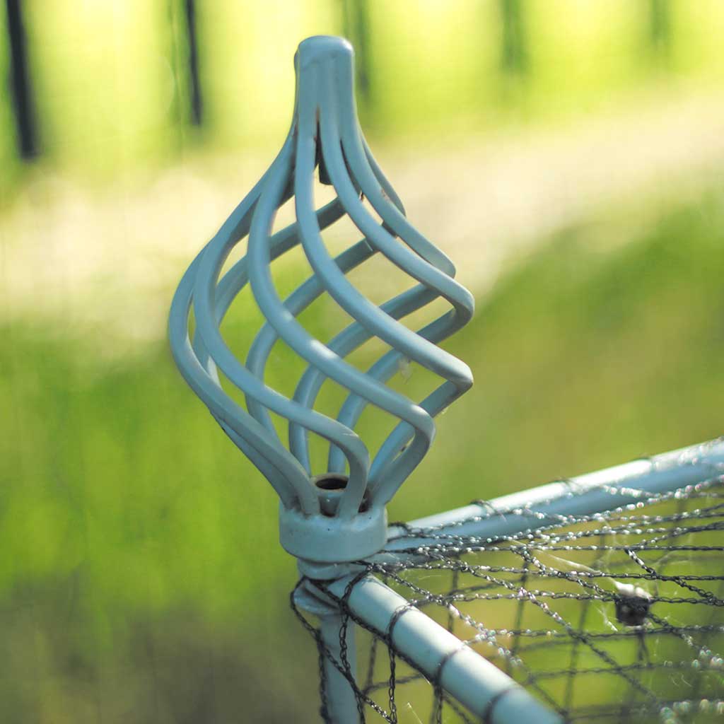 Closeup image of the spiral finial on an Agriframes Elegance Vegetable Cage