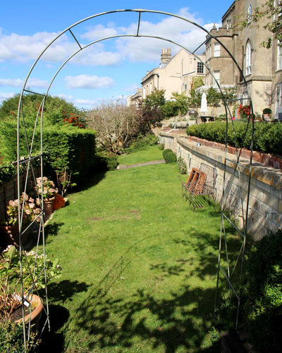 Elegance King Arch-straight on facing garden - agriframes