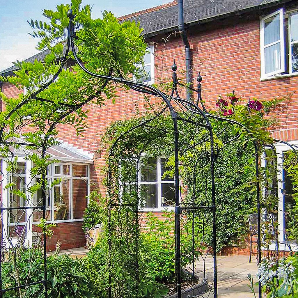Gothic Arch paved with flowers in a sequence of three